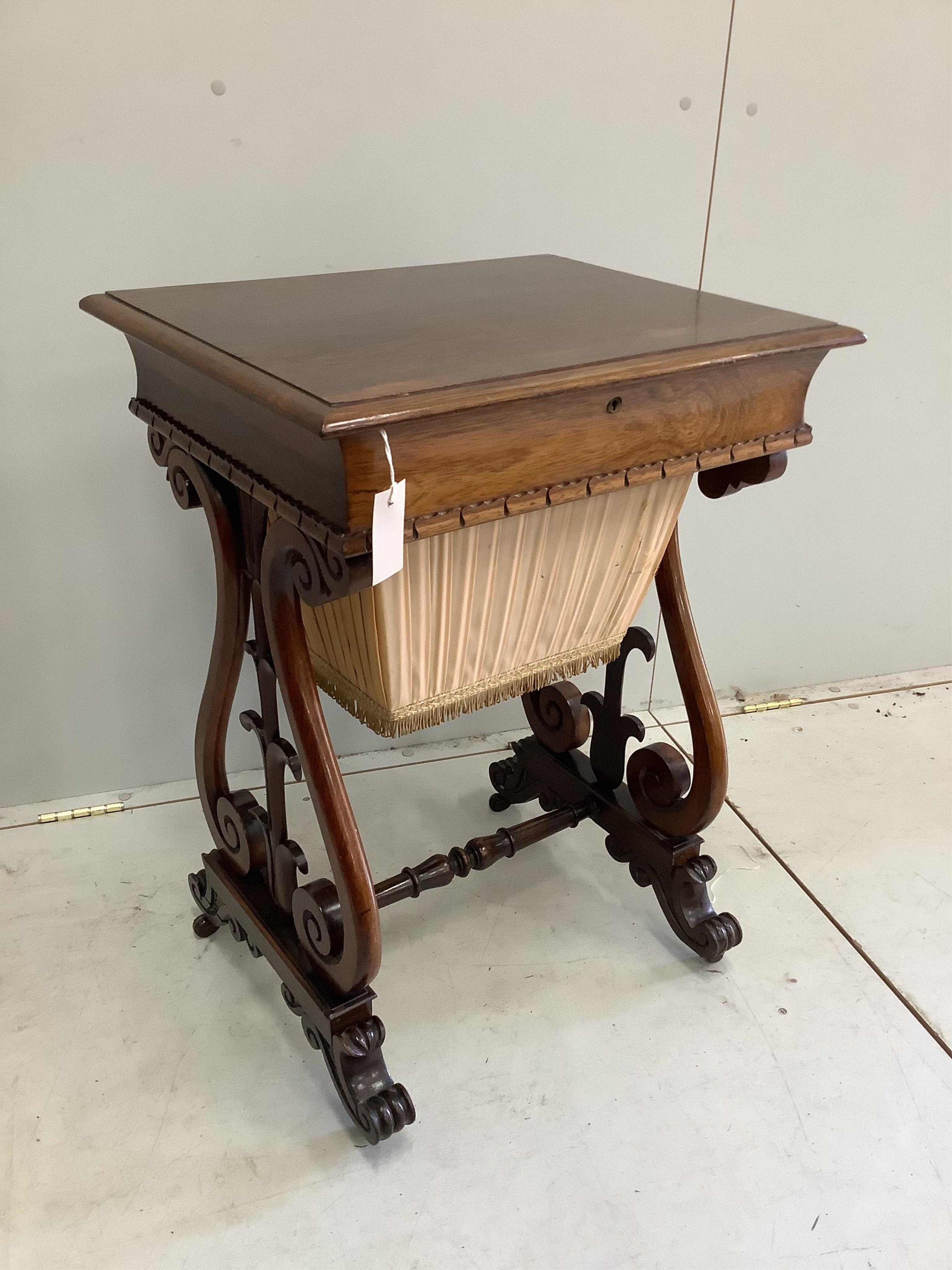 A Victorian rosewood work table, width 56cm. Condition - top faded, otherwise good